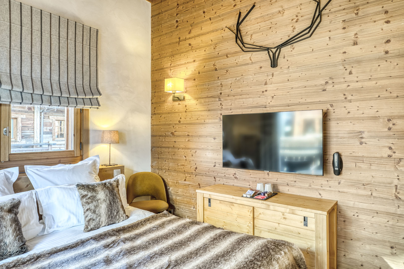 Chambre avec balcon aux Loges Blanches 4* Megève